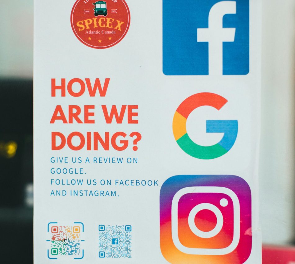 Poster encouraging reviews on Google, Facebook, and Instagram.